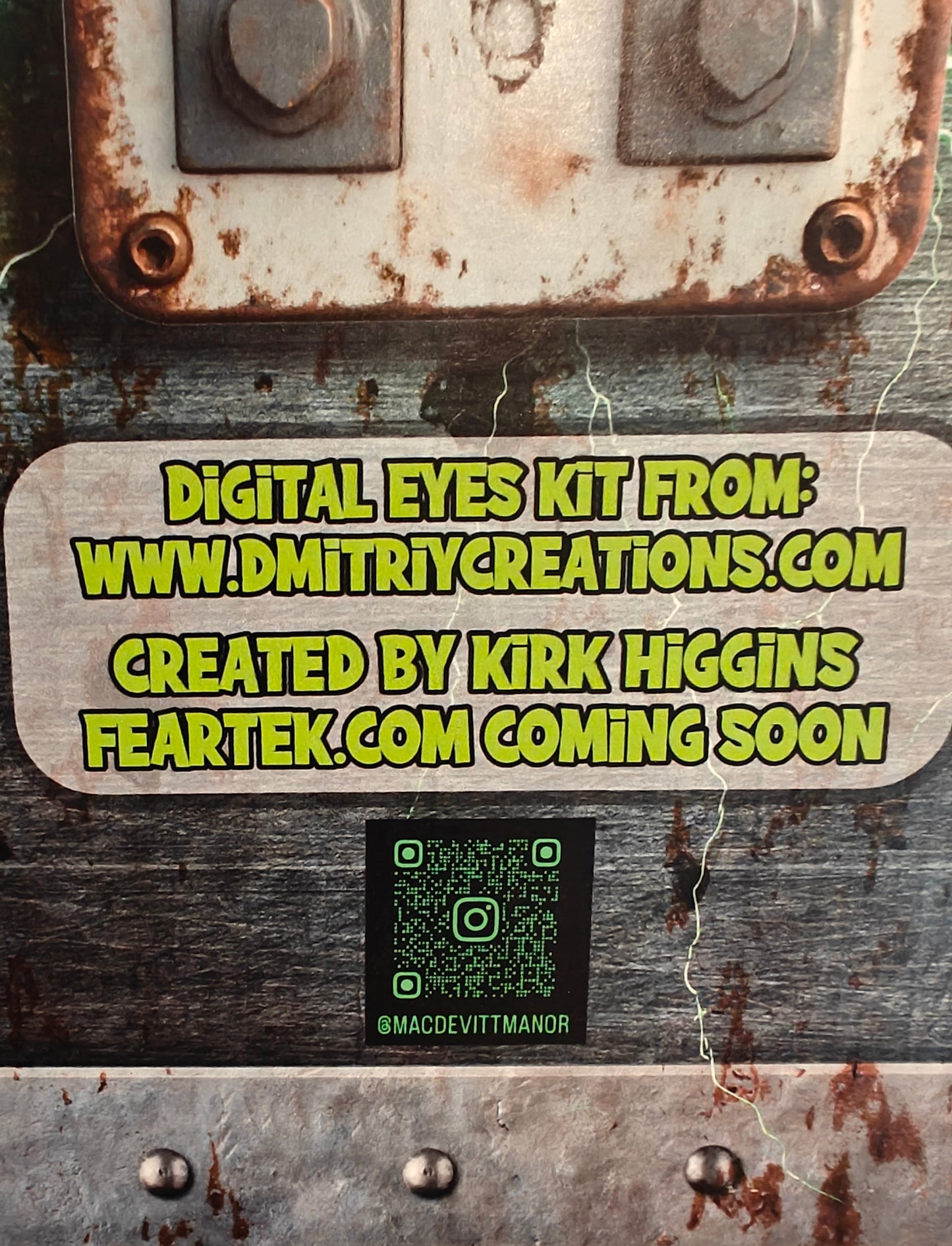 Rust-covered metal surface with text about a digital eyes kit from Dmitriy Creations and Feartek. Frankenstein Monster 3D printed Bust with Living Mummiks Display Box and Digital eyes kit installed. Halloween, Horror Display.