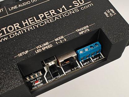 Actor Helper controller with 128mb SD Card included for Scare Actors, front control view showing Setup button, 4 Status LED, Volume or settings control pot, Mode switch 1,2, or 3, 2 separate inputs for triggers 1 and trigger 2