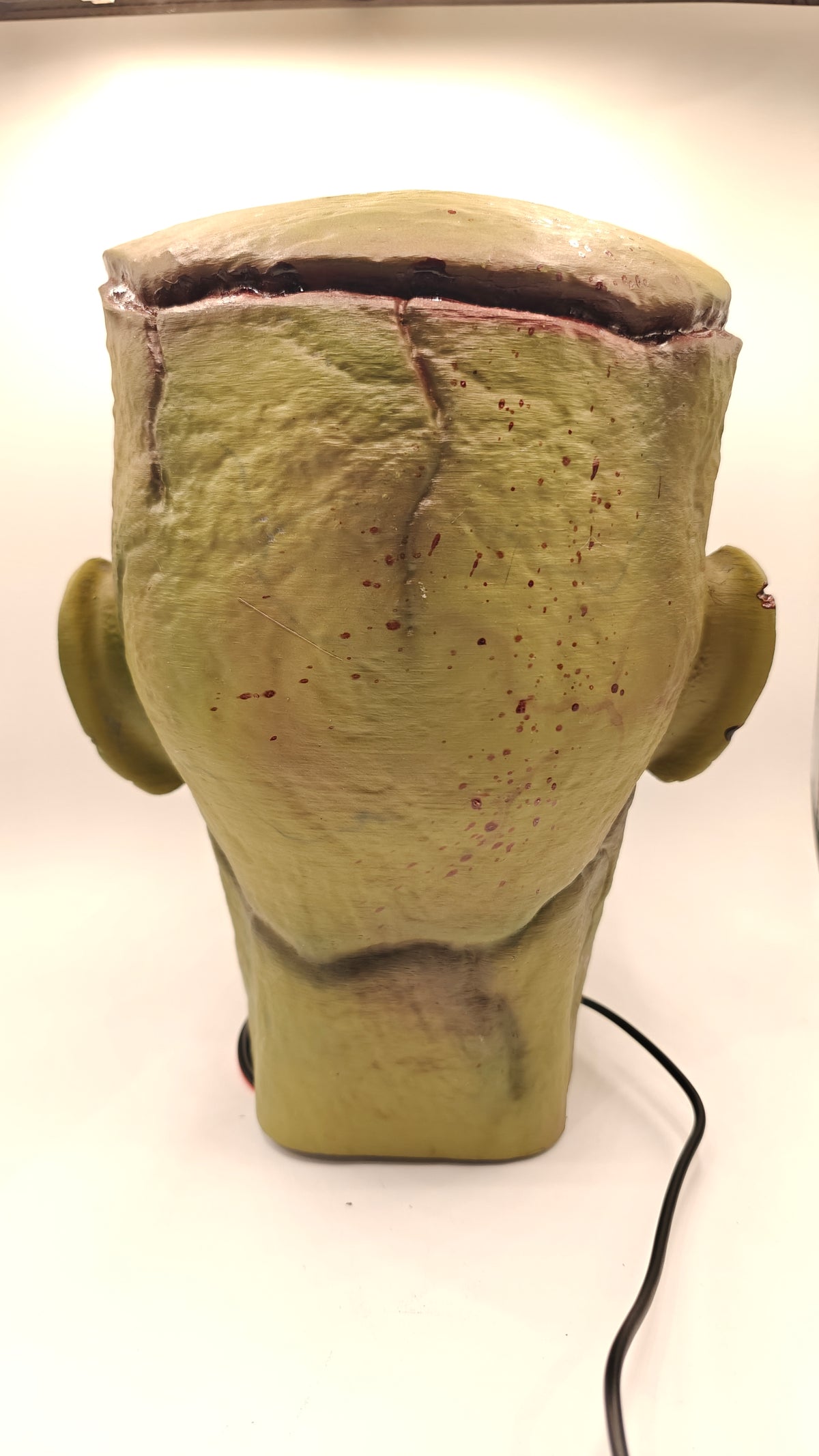Rear view of Frankenstein Bust 1 showing the airbrushed finish and freestanding neck.